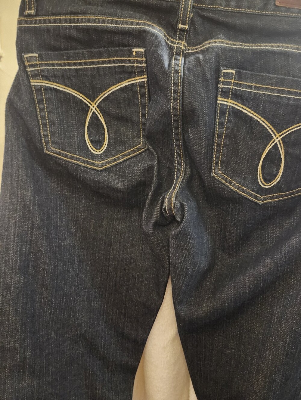 Women's calvin klein, jeanse size, six, awesome pocket design Flare bottom